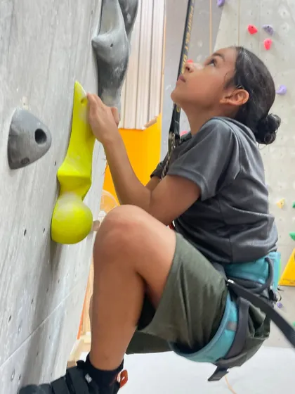 Determination in her eyes. It's amazing to watch kids tackle challenges and overcome them, building resilience and self-esteem.