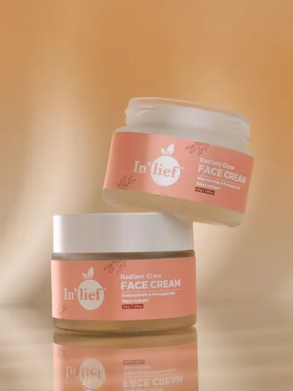 A gravity-defying shot of two In'lief face cream jars, creating a sense of lightness and magic. This playful, creative approach helps a brand stand out.