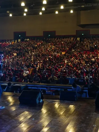 A wide shot showing the scale of the audience at Techfest, IIT Bombay. It's a privilege to command a stage like this and connect with so many people.