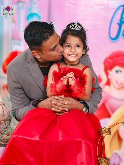 A vibrant 'Super Mario' themed birthday party, with character cutouts, a custom backdrop of the Mushroom Kingdom, and red and green balloons, ready for an adventure.