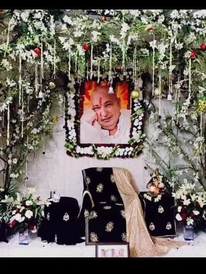 This nature-inspired darbar decoration brings the serenity of a garden indoors. I used real tree branches adorned with hanging strings of white flowers and baby's breath to create a canopy over the gaddi. It’s a unique and peaceful theme for a home satsang.