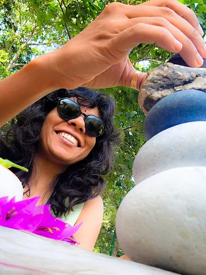 Finding 'glimmers', or small moments of joy and peace, during our 'Realign' retreat. The simple act of stacking stones becomes a meditation on balance, patience, and presence.