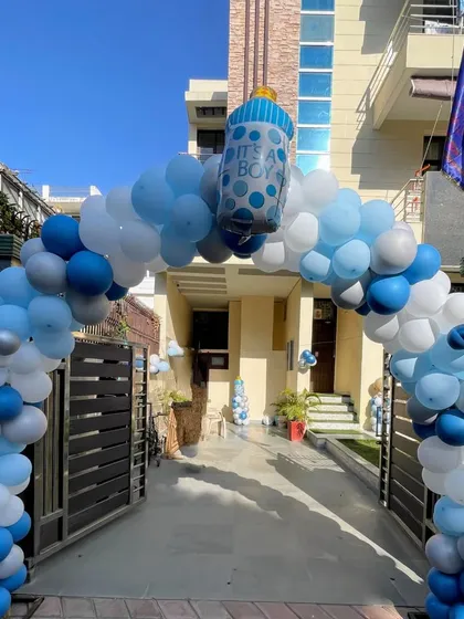 A grand entrance for a baby boy! I can build a full balloon arch right at your doorstep to welcome the little one home in style.