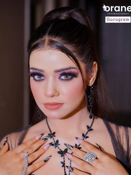 A stunning close up portrait that captures the intensity of the eye makeup and the overall glamorous feel of the look.