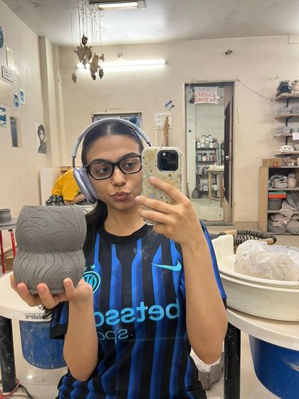 Hithika taking a well-deserved selfie with her freshly carved pot. She’s a ball of energy who makes our classes so fun and reassuring for anyone touching clay for the first time.
