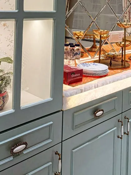 A detailed shot of the PU-painted cabinetry and onyx counter from image 11.