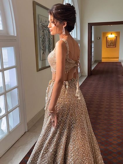 The hairstyle in a real setting. The updo looks polished and stays in place, even as the client moves through the venue.