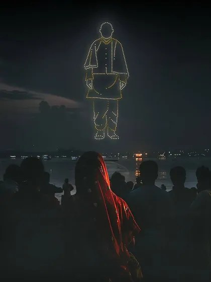 A silhouette of Sardar Vallabhbhai Patel, the Iron Man of India, formed by my drones over a waterfront. These tribute shows are a powerful way to honor national figures during public celebrations.