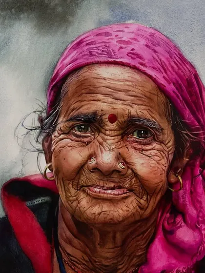 This portrait of an elderly woman in a pink headscarf is a study in capturing a gentle, knowing smile.