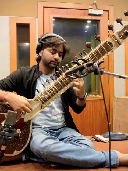 Recording sitar for a devotional song at Mahadev Studio in my hometown of Varanasi. The studio environment is where the magic of music creation happens.