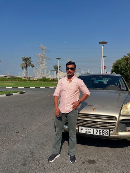 Another shot of Mr. Shaival looking confident and stylish in his custom-made grey jeans, a testament to our happy and well-dressed clientele.