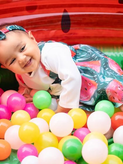 After the smash, it's time for some fun in the ball pit! This watermelon-themed shoot included multiple setups to capture a range of playful moments.
