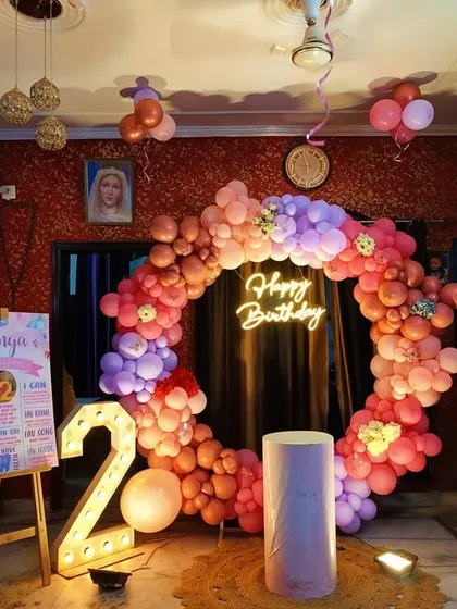 A wide shot of the second birthday party, showing the complete room decoration.