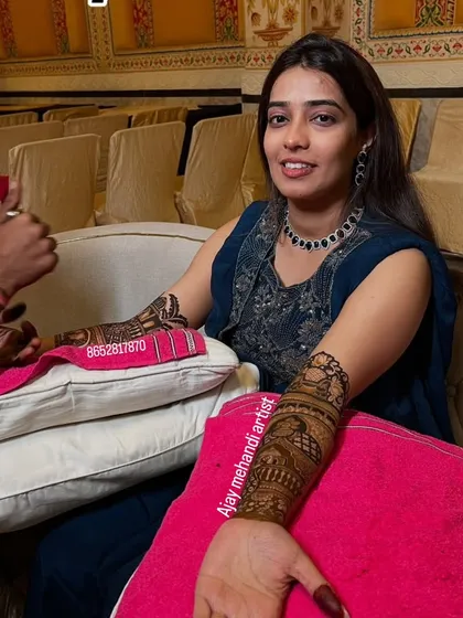 A happy bride during her mehndi application. I make sure my clients are comfortable and relaxed throughout the process.