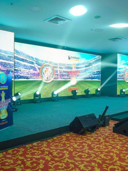 The press conference setup for the Karnataka Premier League, featuring a large LED wall backdrop. We provide all technical equipment for media events.