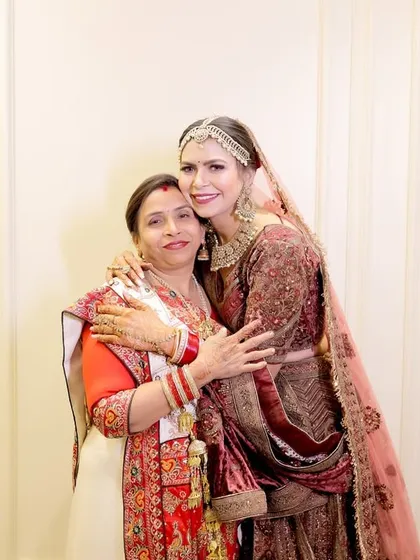 A warm embrace between a bride and her mother before the wedding ceremony. These quiet, behind the scenes moments are just as important to us as the main event.