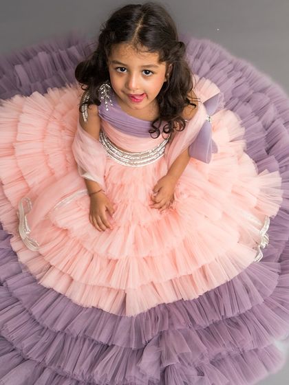 An aerial view of the Alexandra skirt top, showing the incredible volume of the peach and lavender ruffled skirt.