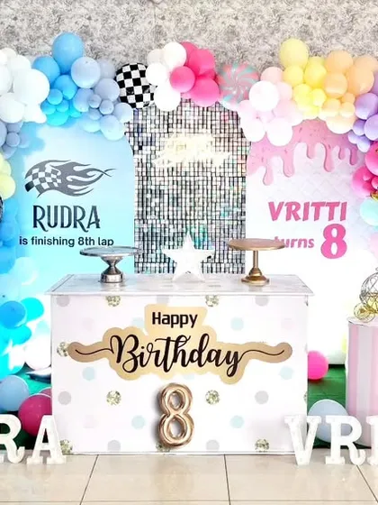 A creative split-theme birthday for an 8-year-old, combining a racing car theme with a sweet treats theme.