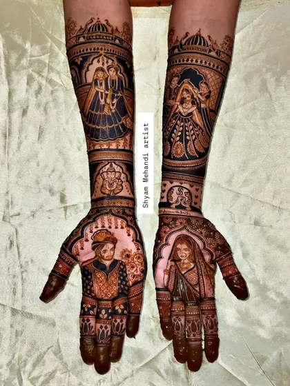 A classic bride and groom portrait design, with a Ganesha motif for blessings, covering the hands and forearms.