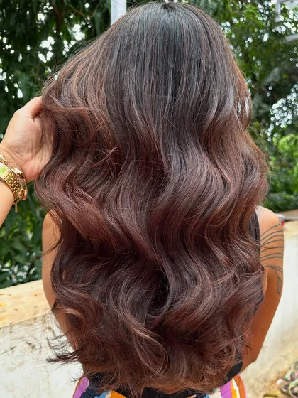 A fresh new look for this client. We did a full color transformation to this rich chocolate brown and finished with a healthy cut and bouncy blowout. The smile at the end says it all.