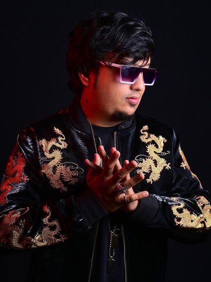 This stylized shot in a dragon-embroidered jacket reflects my belief that miracles are possible once you embrace the struggle.