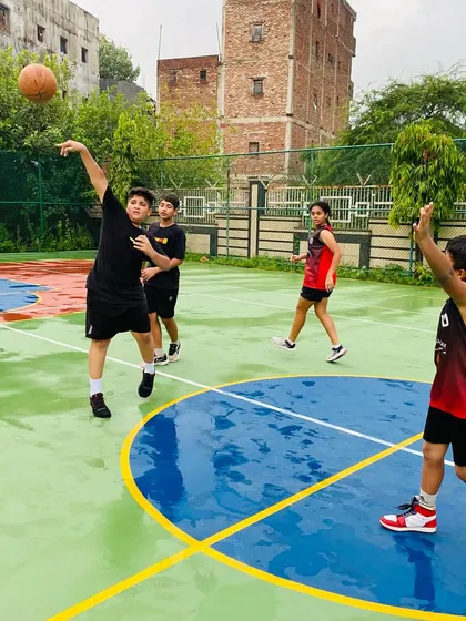 A player takes a jump shot.