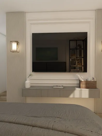 The TV wall in this bedroom design is framed with moulding and fluted panels, creating an elegant and sophisticated look.