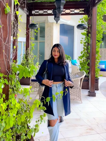 Another angle of this versatile outfit. A well-fitted blazer can instantly elevate even the most casual pieces, making it a must-have for any professional wardrobe.