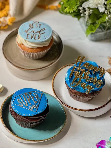 A trio of our "Super Dad" and "Best Dad Ever" cupcakes for Father's Day. The bold blue and gold designs make for a modern and celebratory gift.