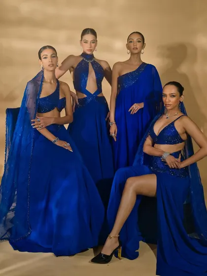 A group shot featuring four different looks from Nikhil Thampi's 'Sapphire Edit'. This type of image is crucial for campaigns to display the breadth and cohesiveness of a collection.