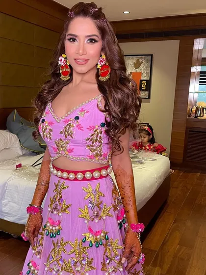 The bride looking gorgeous and ready for her colorful mehendi ceremony.
