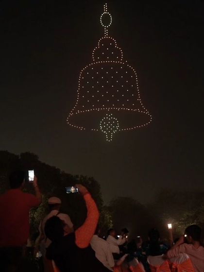 A temple bell formation rings in the celebrations at Dilli Deepotsav. Each formation is carefully designed to resonate with the cultural and spiritual significance of the event.