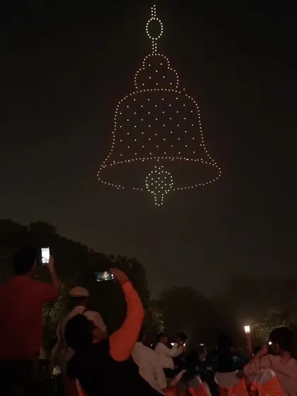 A temple bell formation rings in the celebrations at Dilli Deepotsav. Each formation is carefully designed to resonate with the cultural and spiritual significance of the event.
