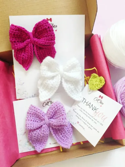 Our crochet sailor bows are a classic for a reason. This gift box shows how we pack our handmade accessories with care, making them ready to gift right away.