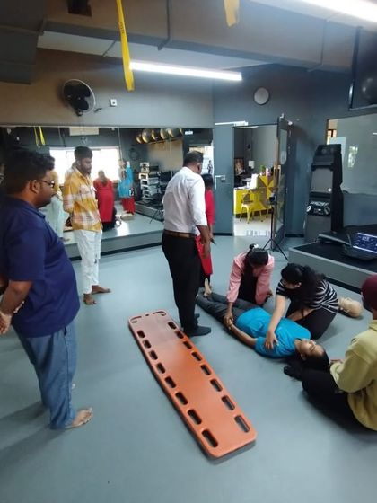 A practical scenario for emergency response. We ensure our trainers are equipped to handle critical situations in the gym.