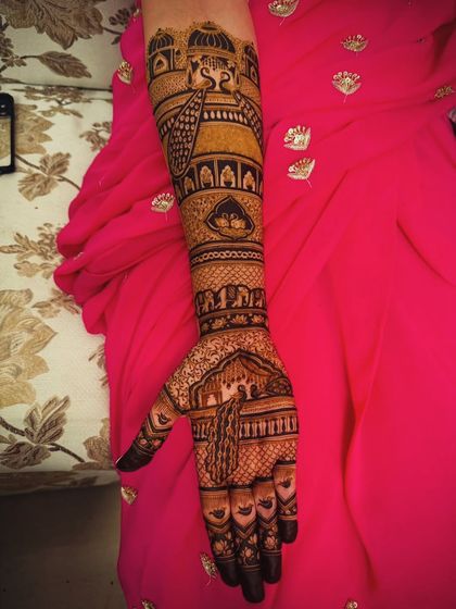 A single-arm view of the previous design, highlighting the intricate peacock and dome details.