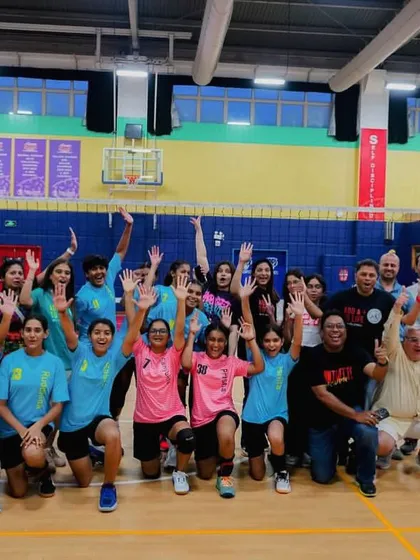 Hands up if you're a champion! The entire team and our supporters celebrating the victory on the court.