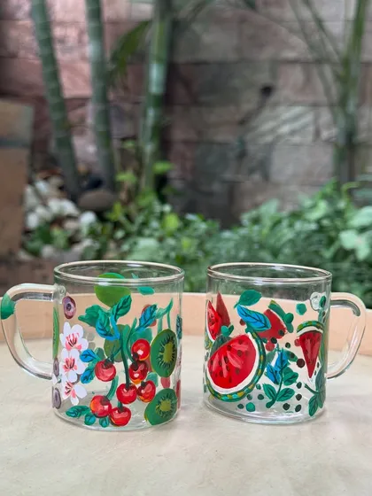 More upcycled cups, this time featuring kiwi, cherry, and watermelon designs. It's a sustainable way to add art to your kitchen.