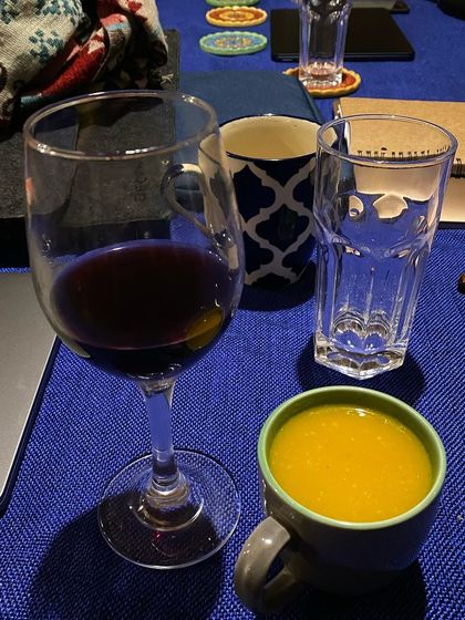 Wine and soup during an evening session. We believe in nourishing the body as well as the mind, creating a holistic and enjoyable retreat experience.