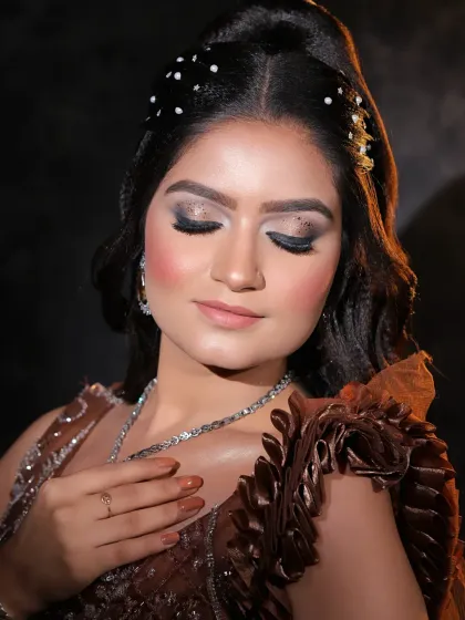 This image highlights the shimmering eye makeup. I used a combination of glitter and soft brown shadows to create a look that is both glamorous and elegant.