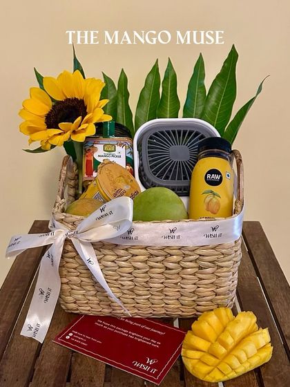 Another view of the "Mango Muse Crate", highlighting the vibrant sunflower and the delicious mango-themed treats inside.