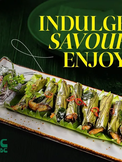 Indulge, savor, and enjoy. These leaf-wrapped fish appetizers are a local delicacy, steamed to perfection to lock in all the flavors.