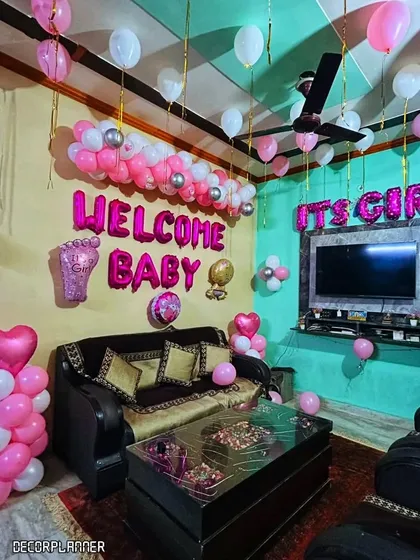 Another perspective of the full room decoration, showing how every corner is filled with celebratory touches. It’s all about creating a magical first impression for the baby and her family.