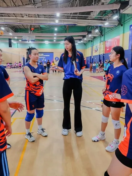 A coach from another participating team strategizing with her players. We learn so much by observing different coaching styles.