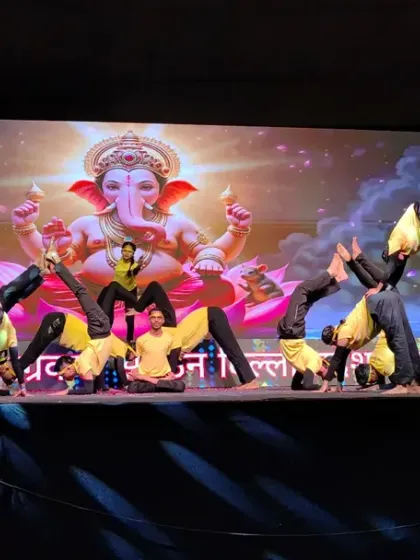 A dynamic and challenging backbend formation performed by our students. Stage performances like this give our students a platform to showcase their dedication and advanced skills.