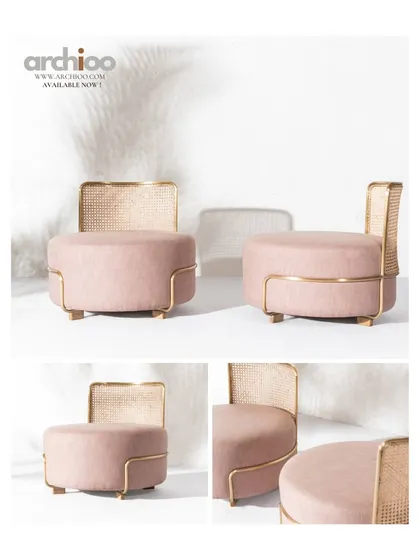 These accent chairs are designed for both comfort and style, featuring plush pink upholstery set against a delicate cane backrest. The frame is finished with subtle brass details, making them a perfect addition to a modern, chic living space.