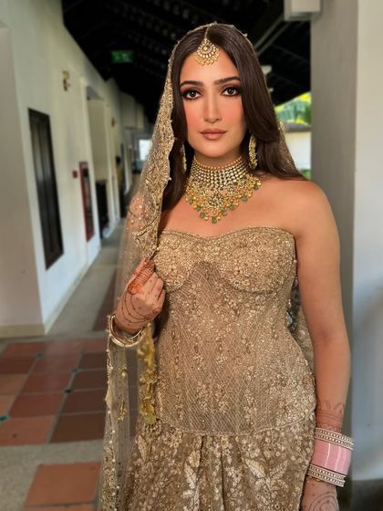 A close-up of a bride's soft, flowing waves, perfect for a classic wedding look.