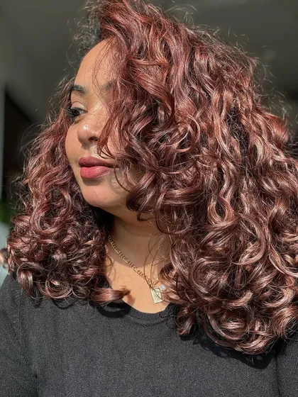 A collection of my other no-bleach balayage and color work, showcasing a variety of tones from subtle browns to vibrant reds on different curl types.