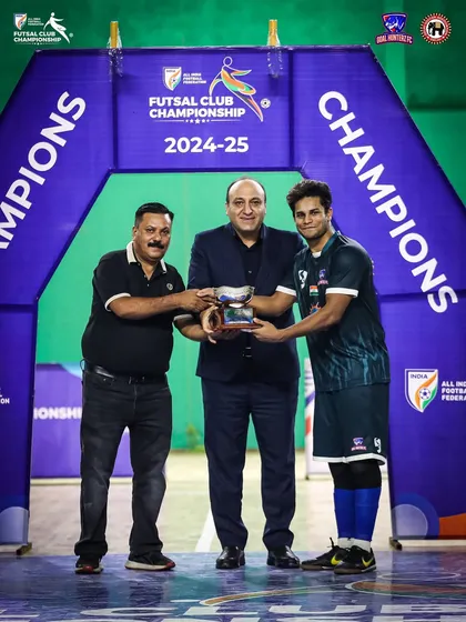 Our wall, Aleef Rahman Mollah, proudly accepting the Best Goalkeeper of the Tournament award. His saves were crucial to our undefeated run.