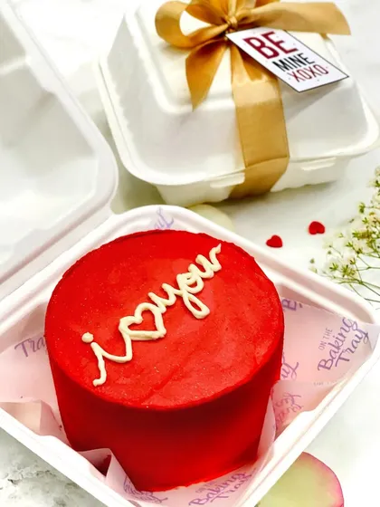 A bold and beautiful red bento cake with "i ❤️ you" piped on top. It's a simple, classic, and delicious way to express your love.